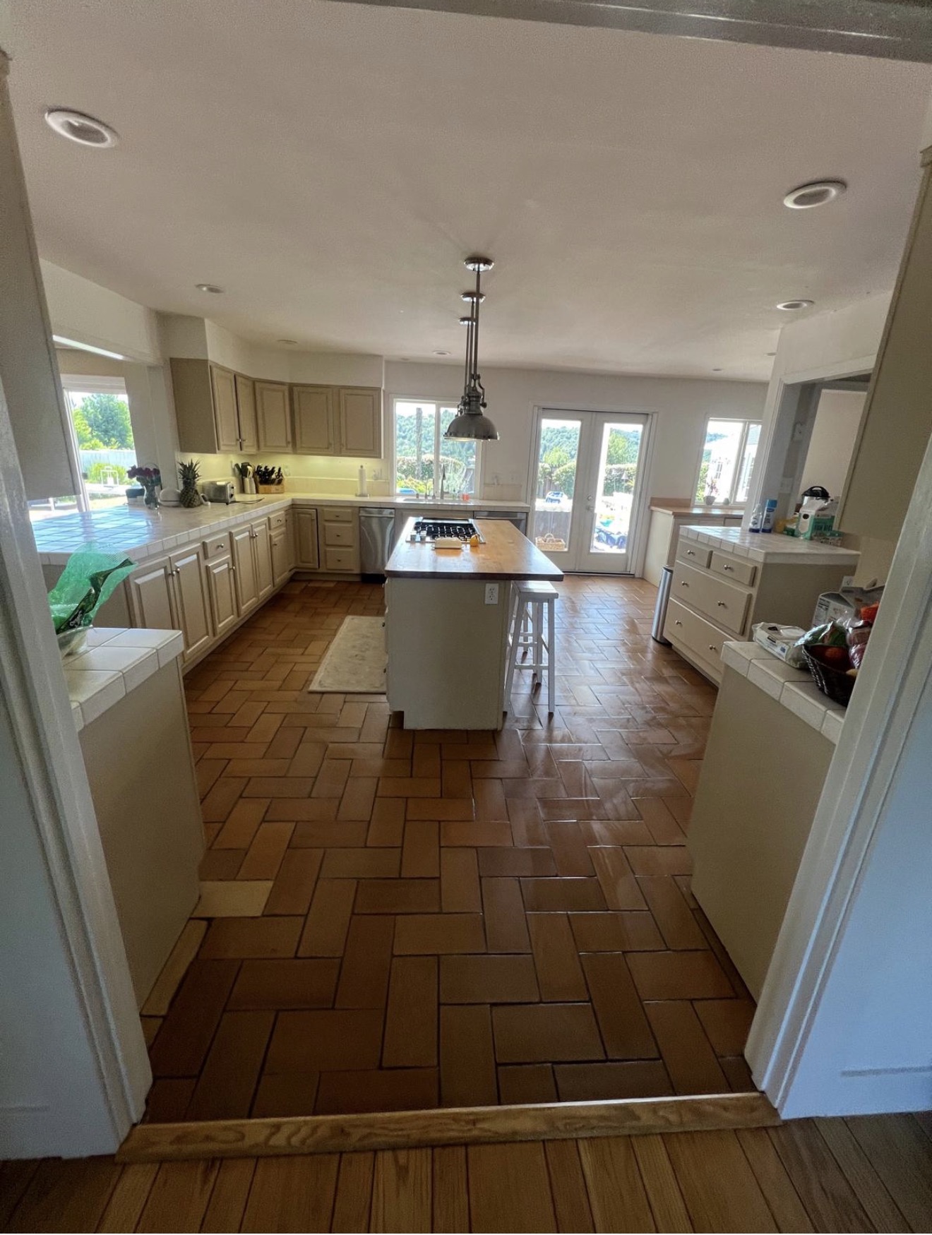 Bright open kitchen kept spotless by a Go Live Cleaning maintenance visit