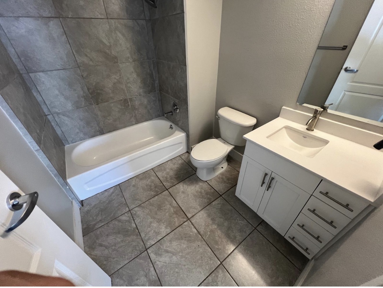 Sparkling tiled bathroom prepared for the next tenant