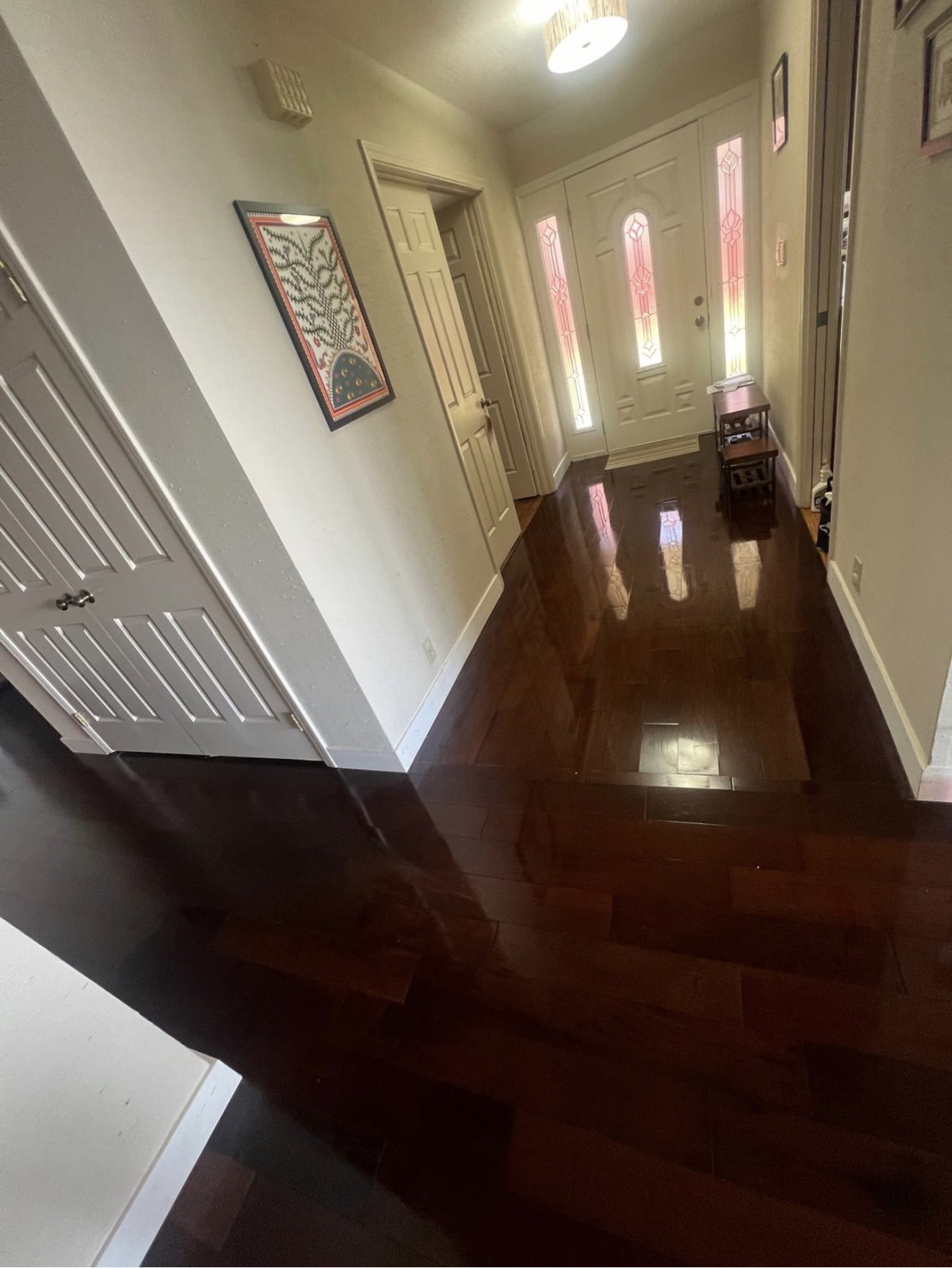 Polished hardwood entryway after a deep clean by Go Live Cleaning