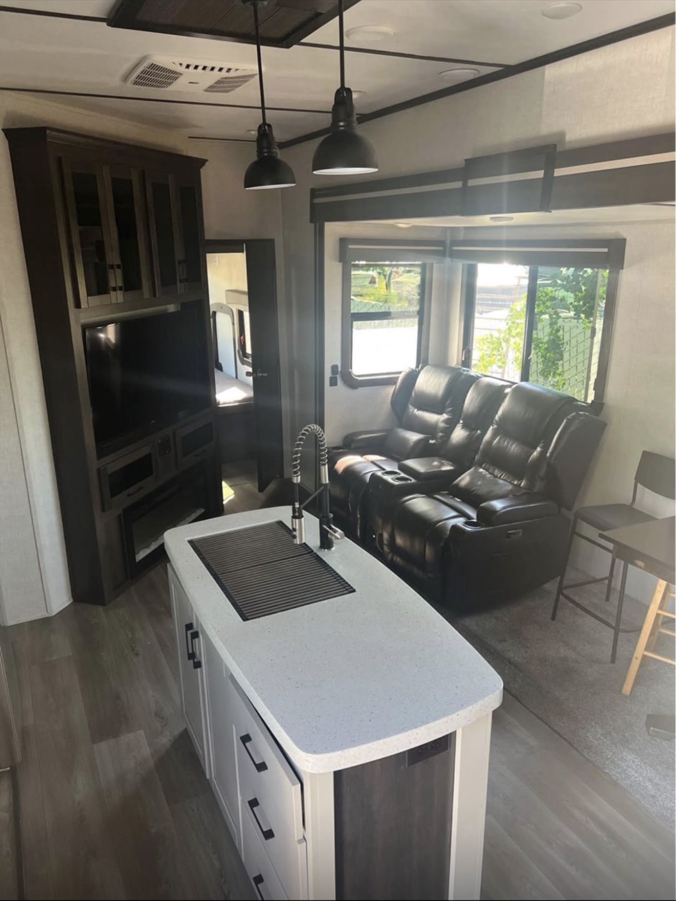 RV interior kitchen and living area detailed for move-out
