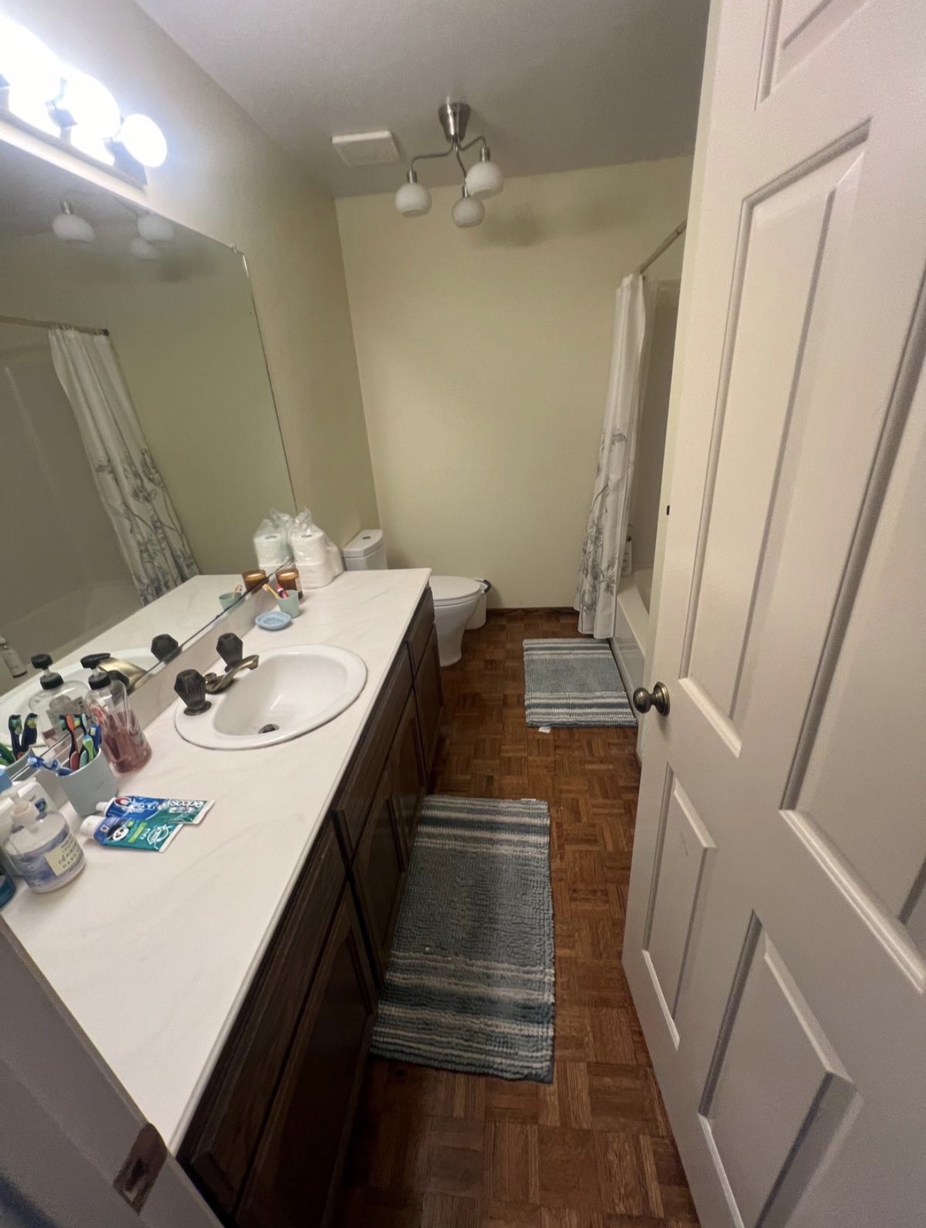 Bathroom vanity and mirror cleaned by Go Live Cleaning